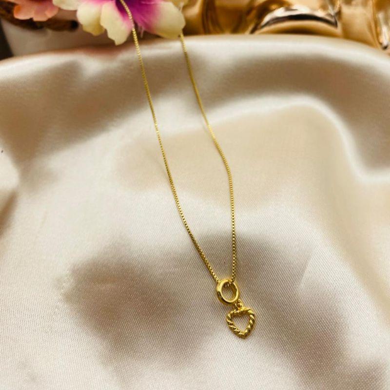 COLAR COM CORAÇÃO VAZADO TORCIDO