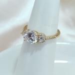 ANEL 3 PEDRAS REDONDAS ZIRCONIA E CRAVEJADO ZIRCONIA METADE