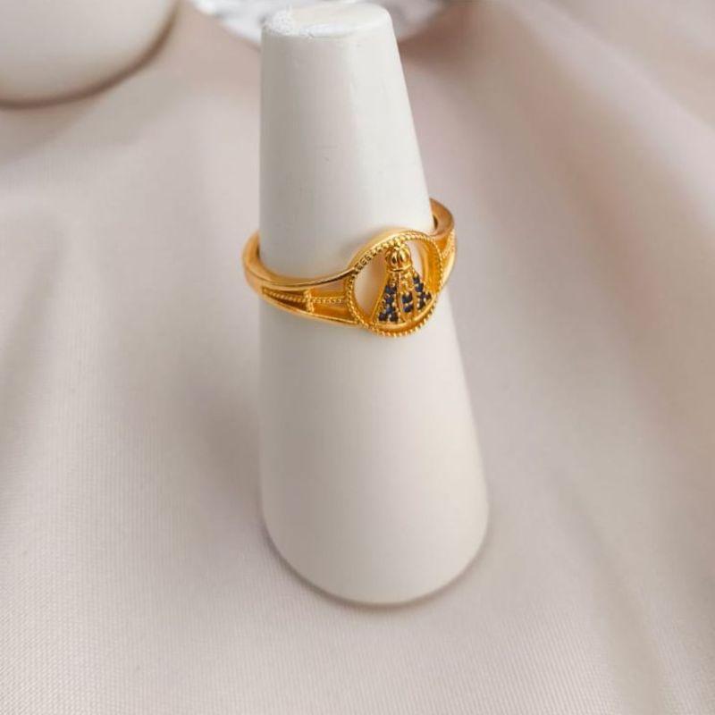 ANEL COM NOSSA SENHORA APARECIDA VAZADO CRAVEJADO EM MICRO ZIRCONIA AZUL