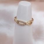 ANEL DETALHES OVAL VAZADO LISO E CAVEJADO ZIRCONIA