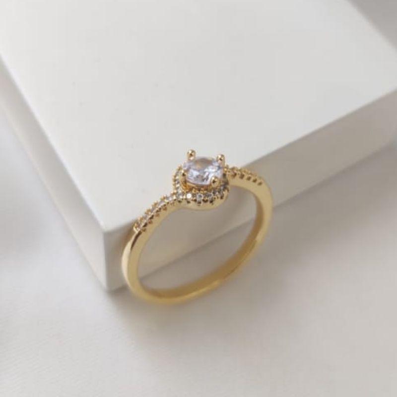 ANEL PEDRA REDONDA CRAVEJADO ZIRCONIA AO REDOR