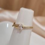 ANEL SOLITARIO PEDRA OVAL DUPLO LATERAL LISO E ZIRCONIA