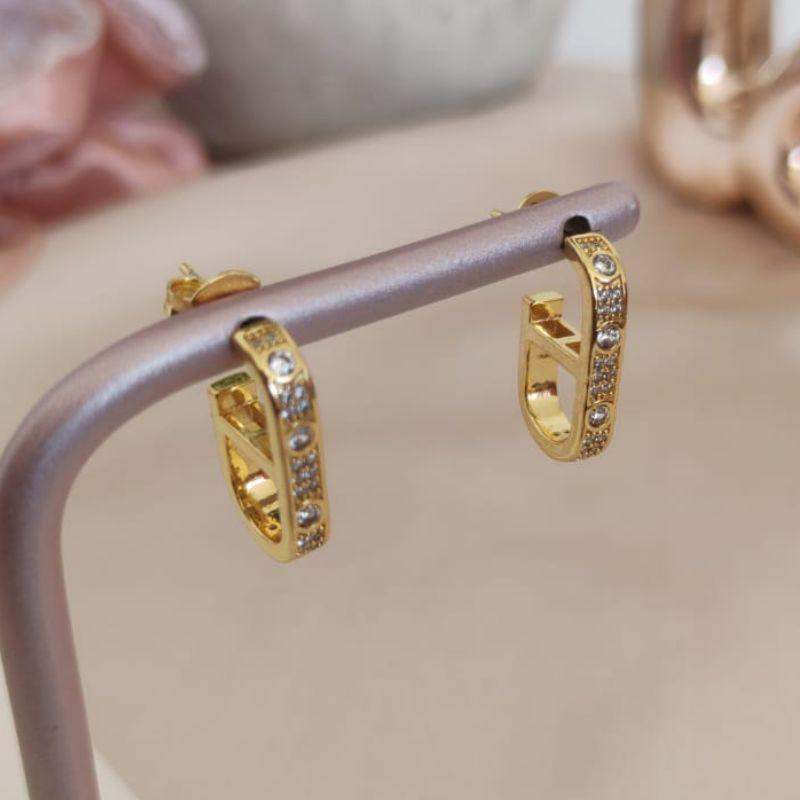 ARGOLA PARTIDA COM ZIRCONIA E MICRO ZIRCONIA NA FRENTE