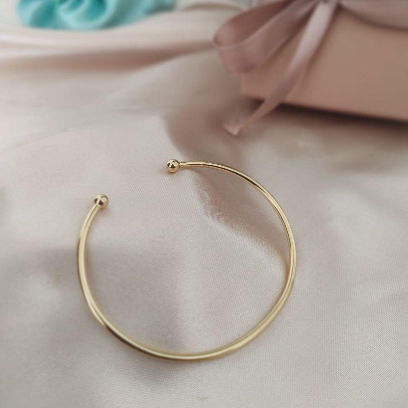 BRACELETE LISO PARTIDO COM ESFERAS NAS PONTAS 1,5MM