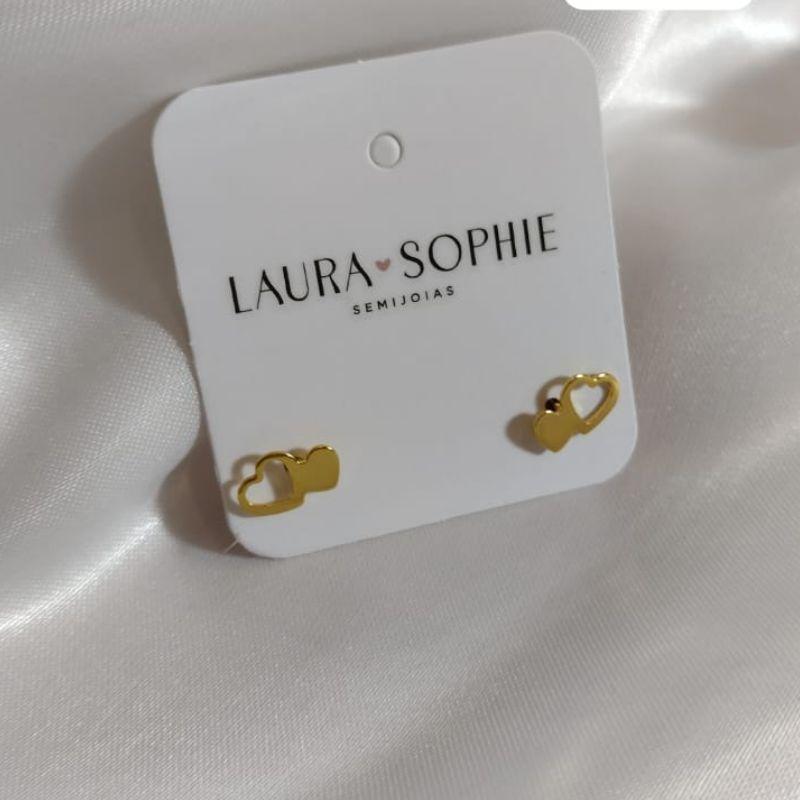 BRINCO 2 CORAÇÕES UM VAZADO E OURO PLACA