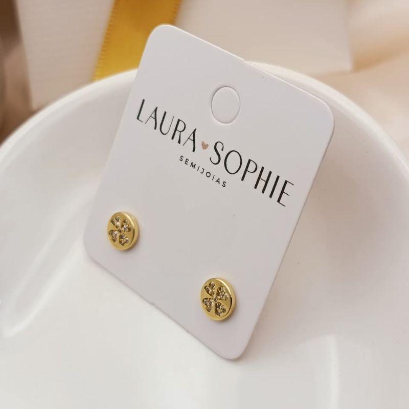 BRINCO REDONDO COM TREVO NO MEIO CRAVEJADO EM MICRO ZIRCONIAS