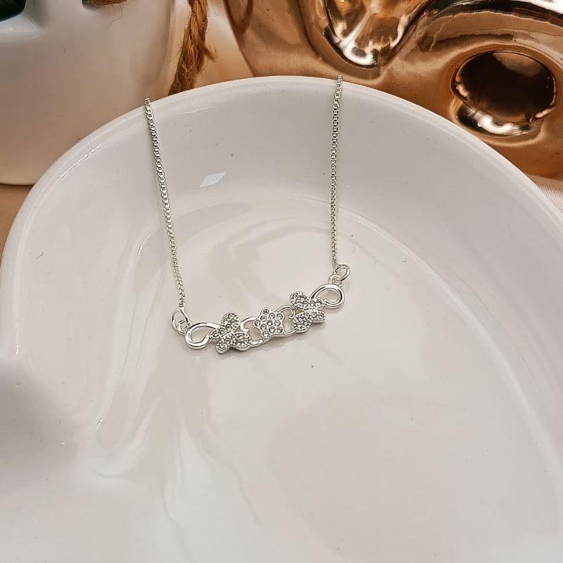 COLAR COM 2 BORBOLETA E ESTRELA NO MEIO CRAVEJADA EM MICRO ZIRCONIA