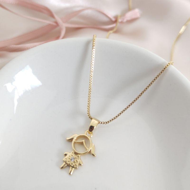 COLAR COM PINGENTE DE MENINA COM UM PONTO DE LUZ FILHOS