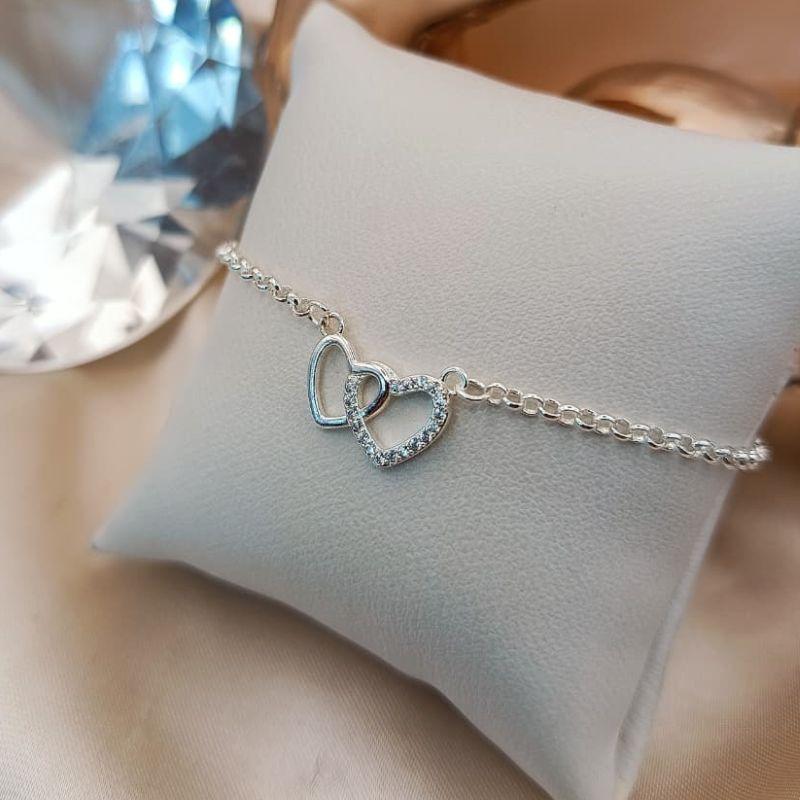 PULSEIRA COM 2 CORAÇÕES LISOE CRAVEJADO EM MICRO ZIRCONIA