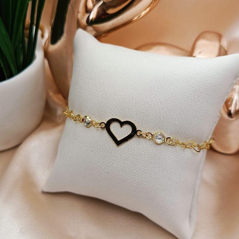 PULSEIRA COM CORAÇÃO VAZADO LISO E PEDRAS DE ZIRCONIA DOS LADOS