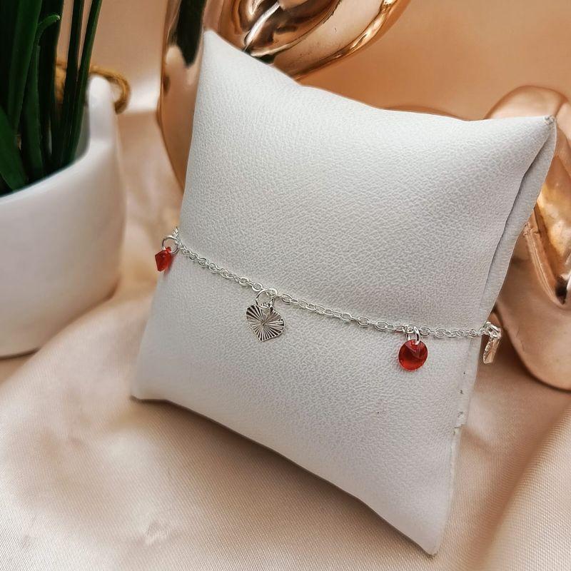 PULSEIRA COM PINGENTE PONDE DE LUZ VERMELHO E CORAÇÃO FOSCO