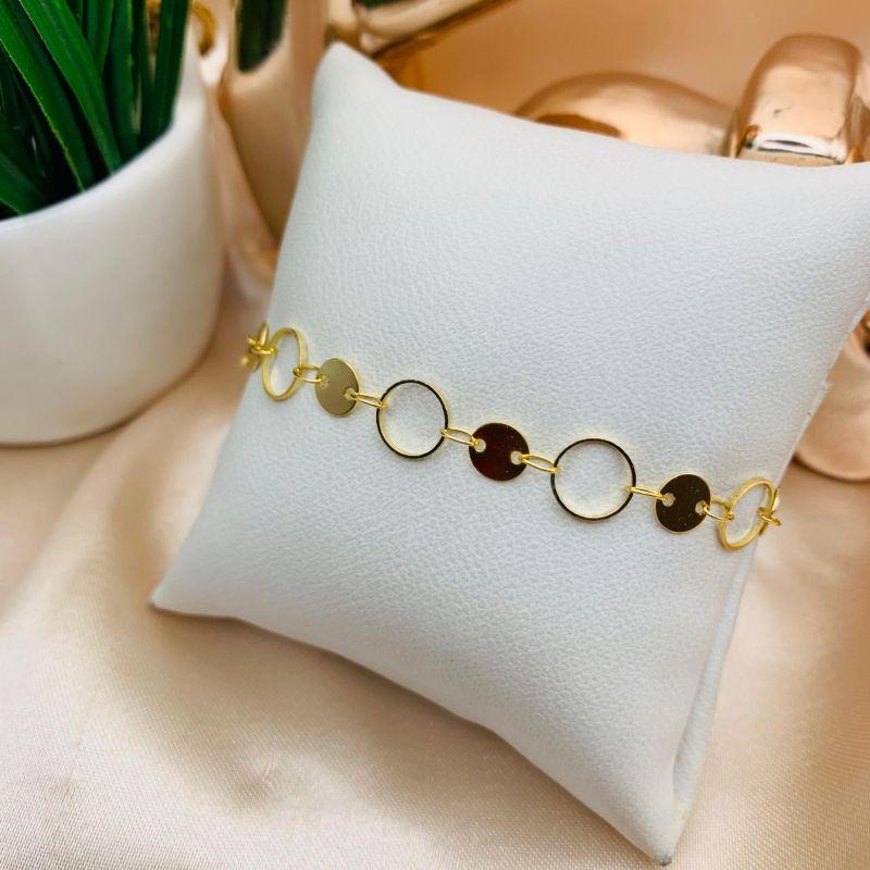 PULSEIRA COM PLACA CIRCULO E VAZADAS INTERCALADAS