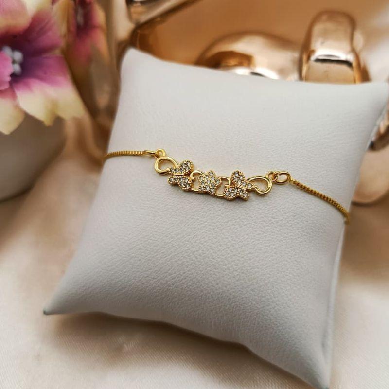 PULSEIRA COPM BORBOLETAS E ESTRELA NO MEIO CRAVEJADAS EM MICRO ZIRCONIA