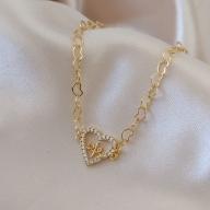 PULSEIRA DE CORAÇÃO ENTRELAÇADOS PINGENTE CORAÇÃO FÉ