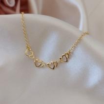 PULSEIRA ELO PORTUGUES COM CORAÇÃO VAZADO MAIOR E MENOR UM DO LADO DO OUTRO