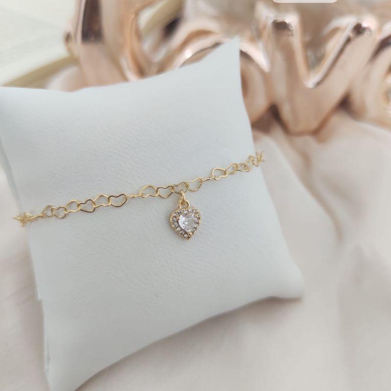 PULSEIRA INFANTIL DE CORAÇÕES ENTRELAÇADOS E CORAÇÃO CRAVEJADO EM MICRO ZIRCONIA