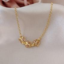 PULSEIRA INFANTIL ELO PORTUGUES COM 3 BORBOLETAS BEGE