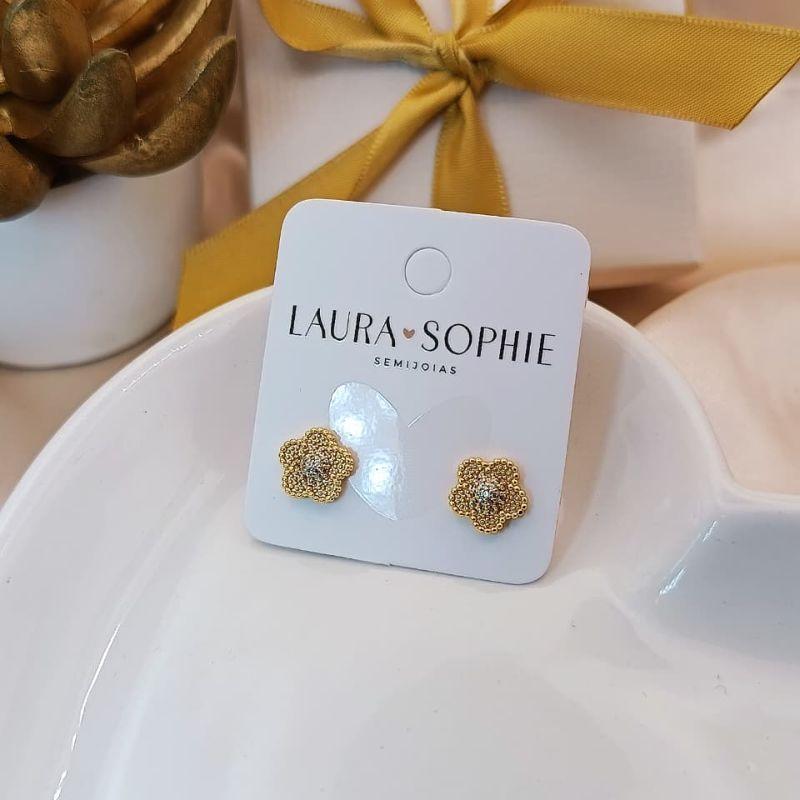 BRINCO DE FLOR COM EFEITO DE BOLINHAS E CRAVEJADO EM MICRO ZIRCONIA NO MEIO