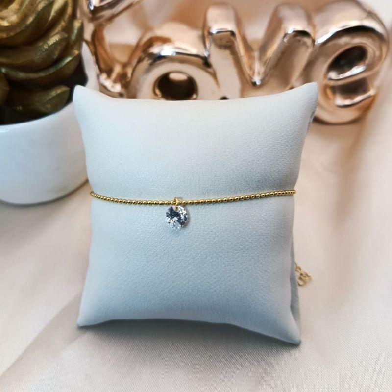 PULSEIRA TEXTURIZADA DE BOLINHAS COM PINGENTE DE CRISTAL