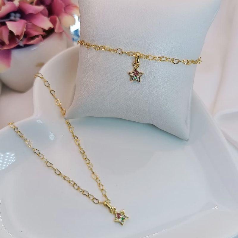 CONJUNTO INFANTIL COM ESTRELA CRAVEJADA EM MICRO ZIRCONIA COLORIDAS