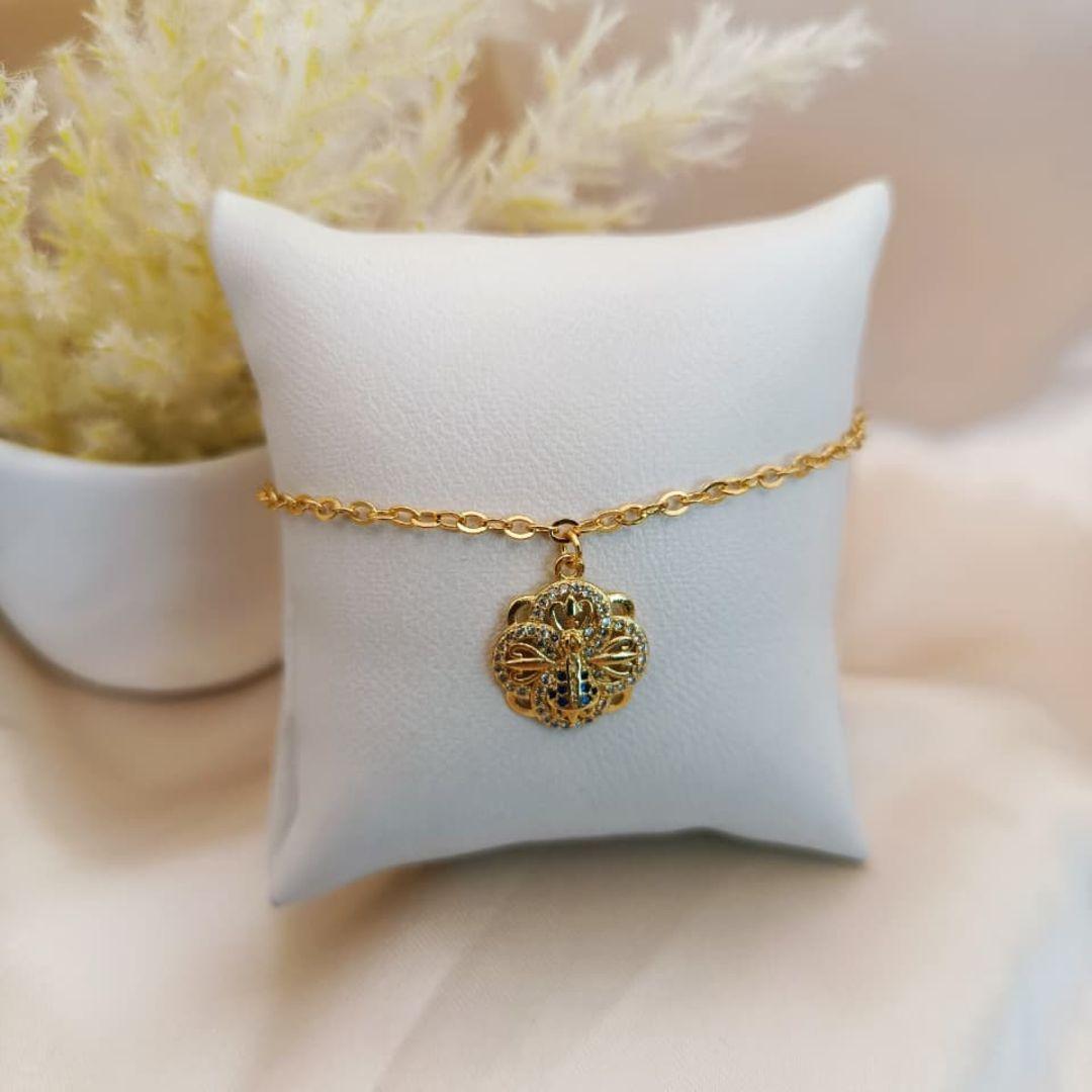 PULSEIRA COM NOSSA SENHORA E FLOR CRAVEJADO EM MICRO ZIRCONIA