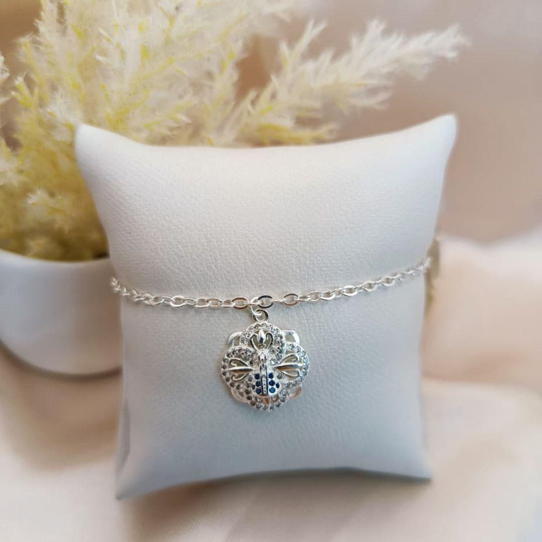 PULSEIRA COM NOSSA SENHORA E FLOR CRAVEJADO EM MICRO ZIRCONIA