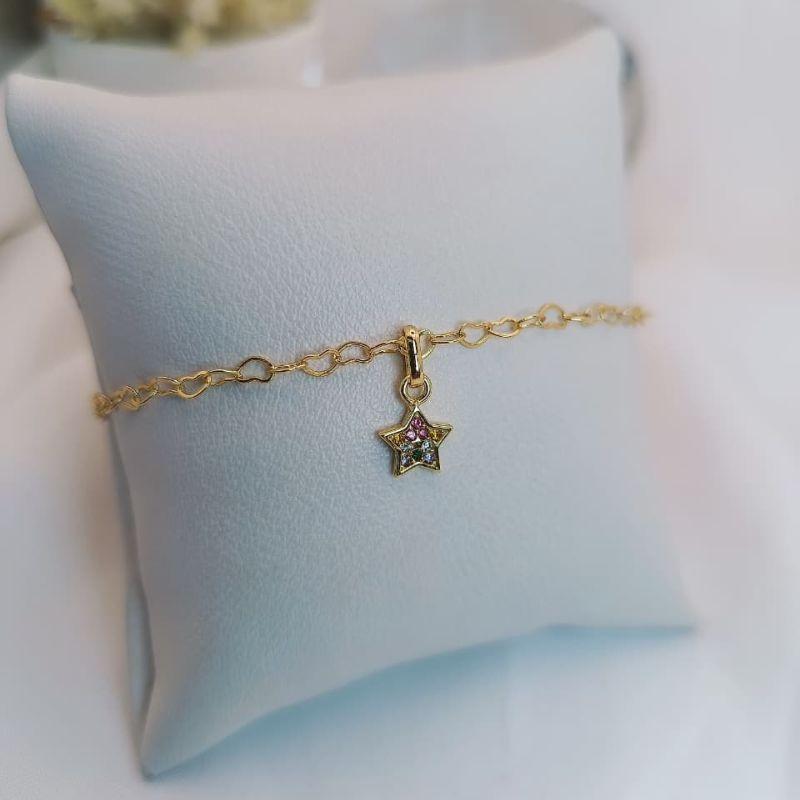 PULSEIRA COM PINGENTE DE ESTRELA CRAVEJADA EM MICRO ZIRCONIA COLORIDA