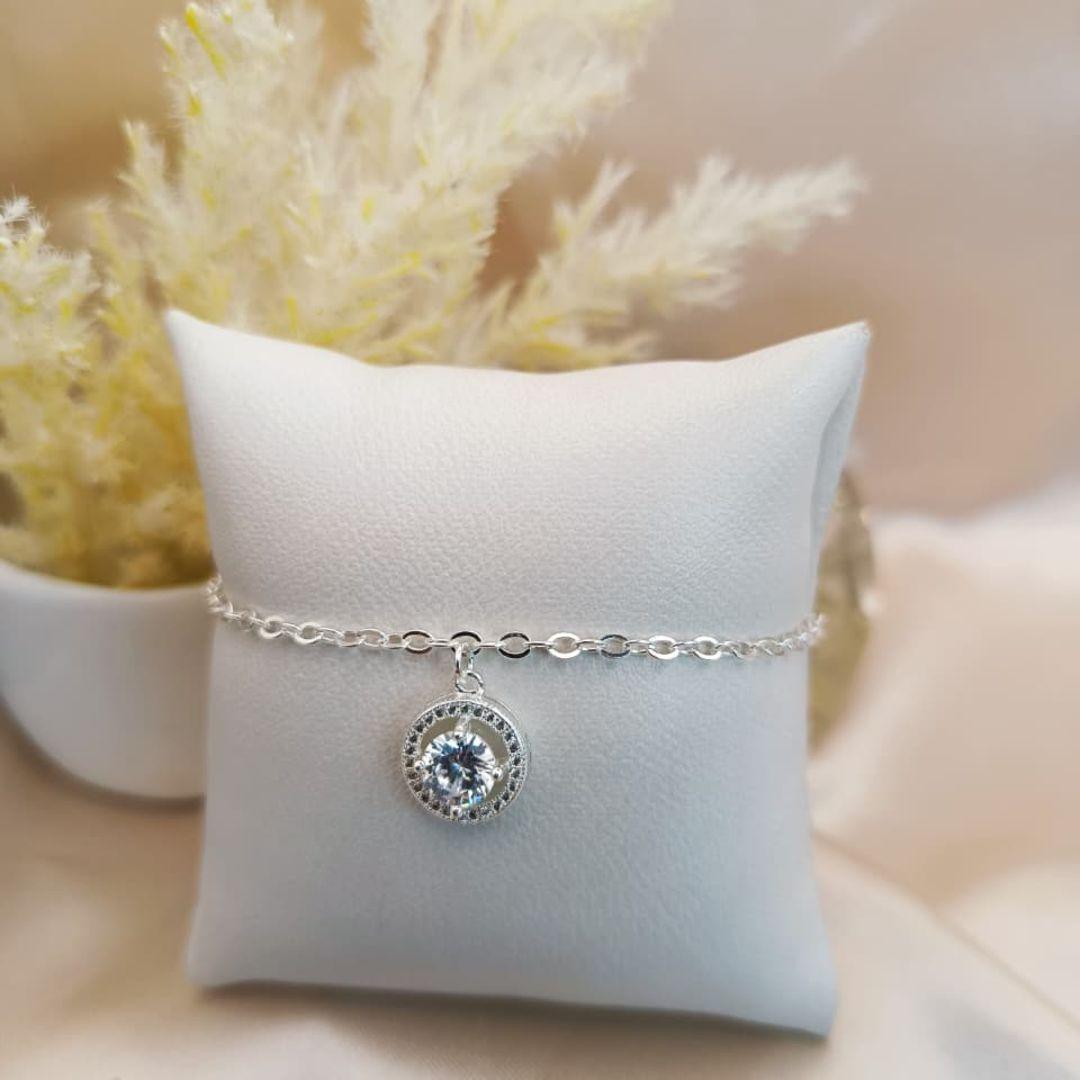 PULSEIRA COM PINGENTE REDOMDO E PEDRA NO MEIO CRAVEJADO EM MICRO ZIRCONIA AO REDOR
