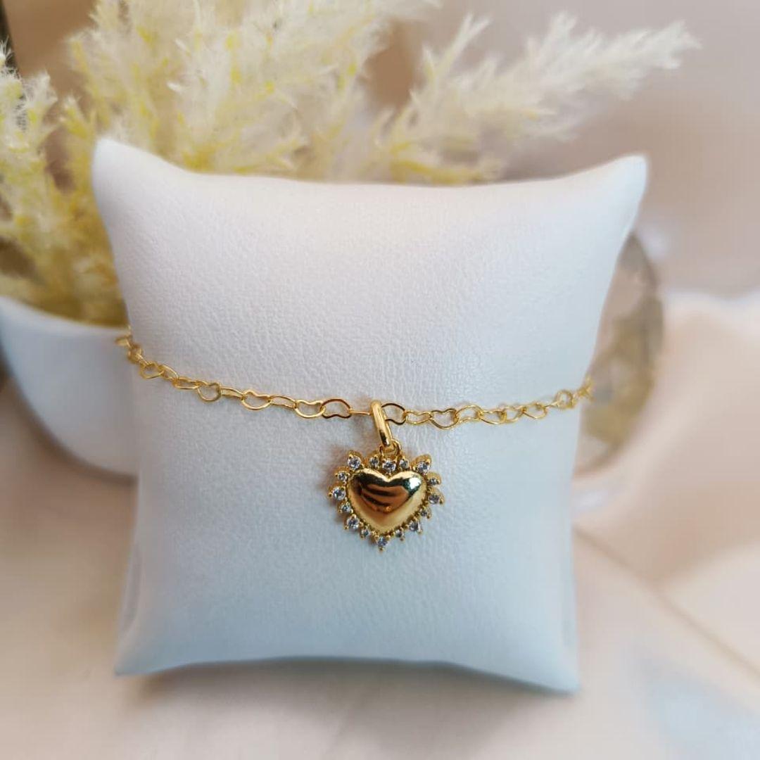 PULSERIA COM CORAÇÃO LISO E PEDRAS DE MICRO ZIRCONIA AO REDOR