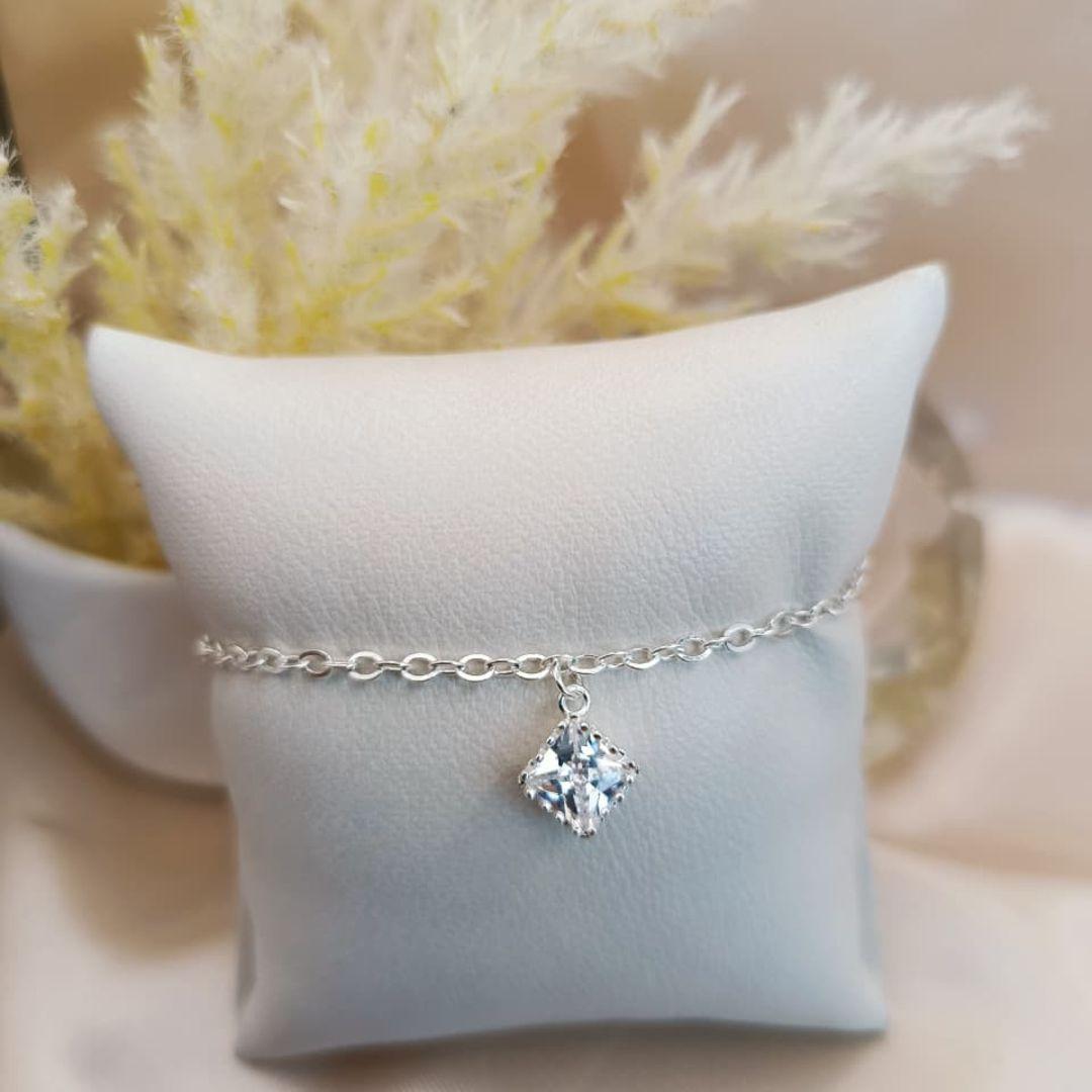 PULSIRA COM PEDRA DE ZIRCONIA QUADRADA